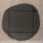Cut base from flattened polymer clay...