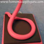 Form first part of Taurus symbol...