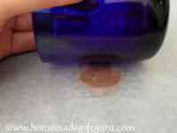 Flatten a ball of polymer clay between two sheets of wax paper...