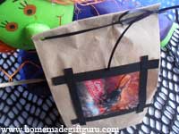 This DIY Halloween party bag idea starts with a simple brown paper lunch bag. It also makes a unique homemade gift bag for giving homemade Halloween gifts and homemade Halloween treats.