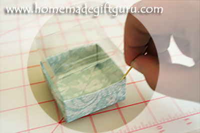 Tip... use a toothpick to flatten the flaps inside the handmade gift box.