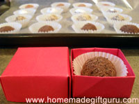 Homemade truffles look scrumptious, nestled inside an origami box.