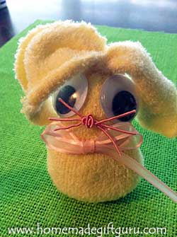 Make sock bunnies using baby socks for cute little sock rabbits that fit inside large plastic Easter eggs.