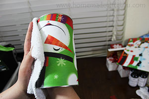 Smooth out the gift bag, using a cloth is helpful.
