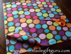 Fleece is AWESOME! The edges won't fray like most fabric and your local craft store will likely have hundreds of fleece colors, patters and fantastic themes. Learn how to make a fleece pillow here.